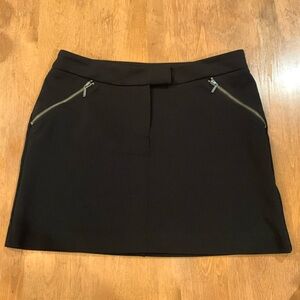 Express black mini skirt size 2 real zipper front, fake zipper pockets